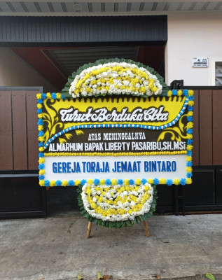 Papan Bunga Duka di Kandang